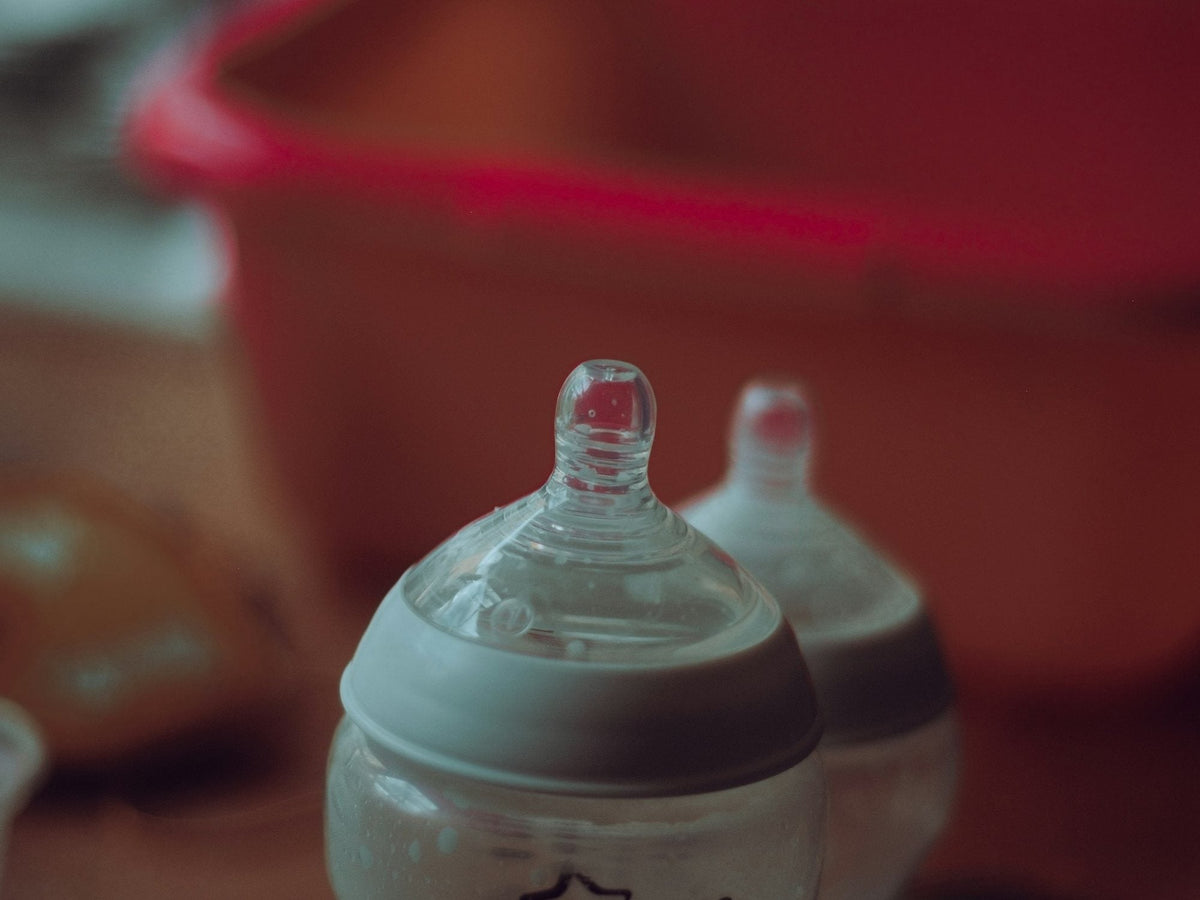 Close-up of two baby bottle nipples